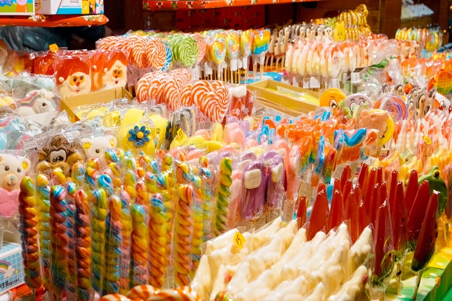 bright colorful candies and lollipops at a market stall